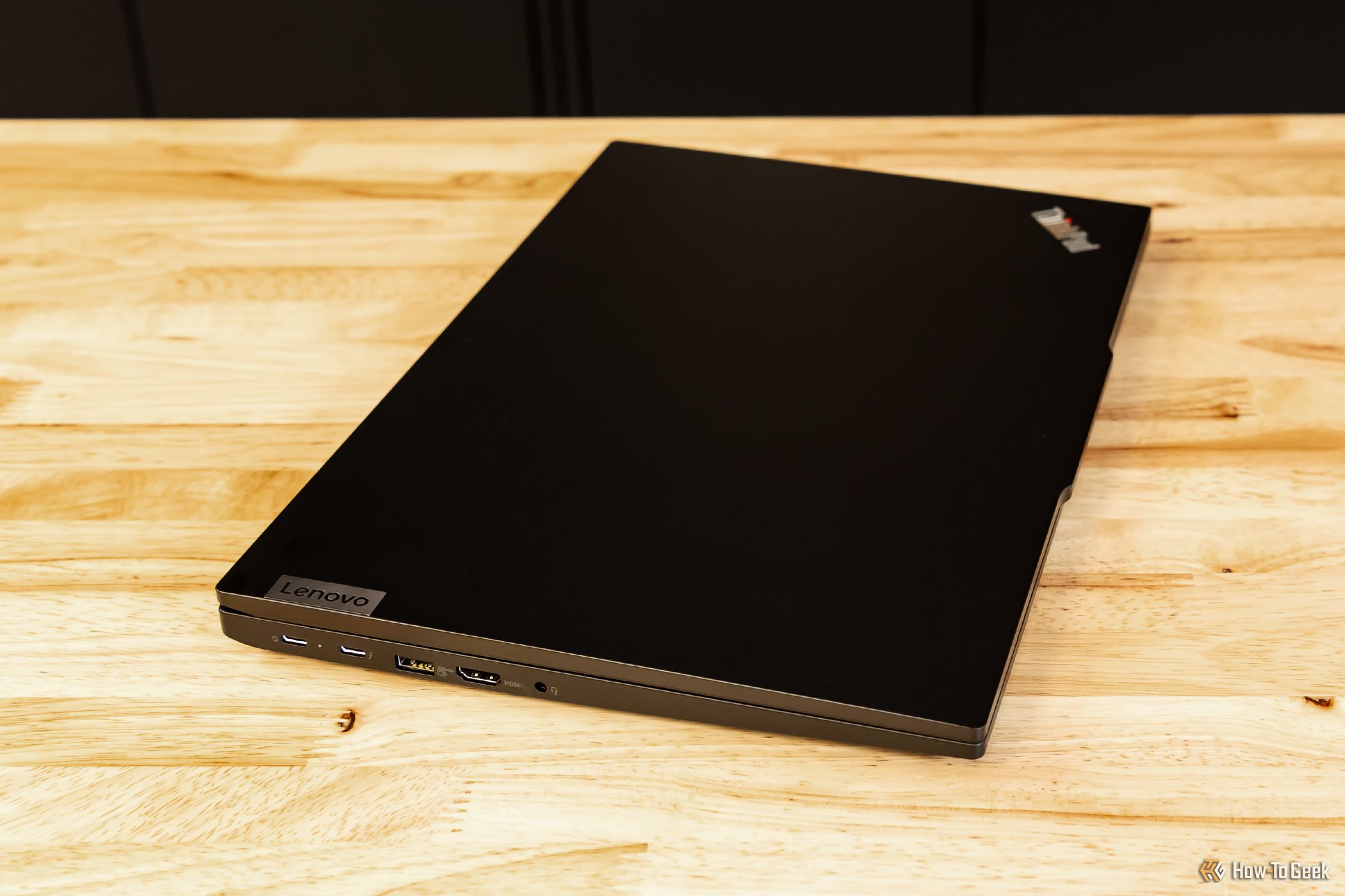 Lenovo ThinkPad E16 Gen 1 closed on a desktop showing its left side